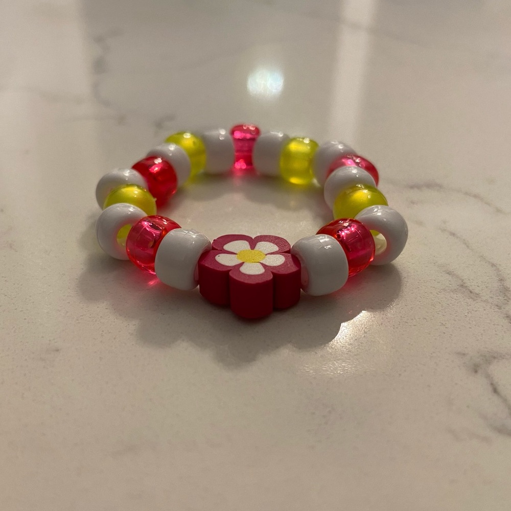 Handmade beaded and charmed bracelet
